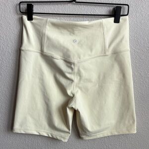Athleta Ultra High Rise Elation 7 inch Short Butter Yellow sz Medium